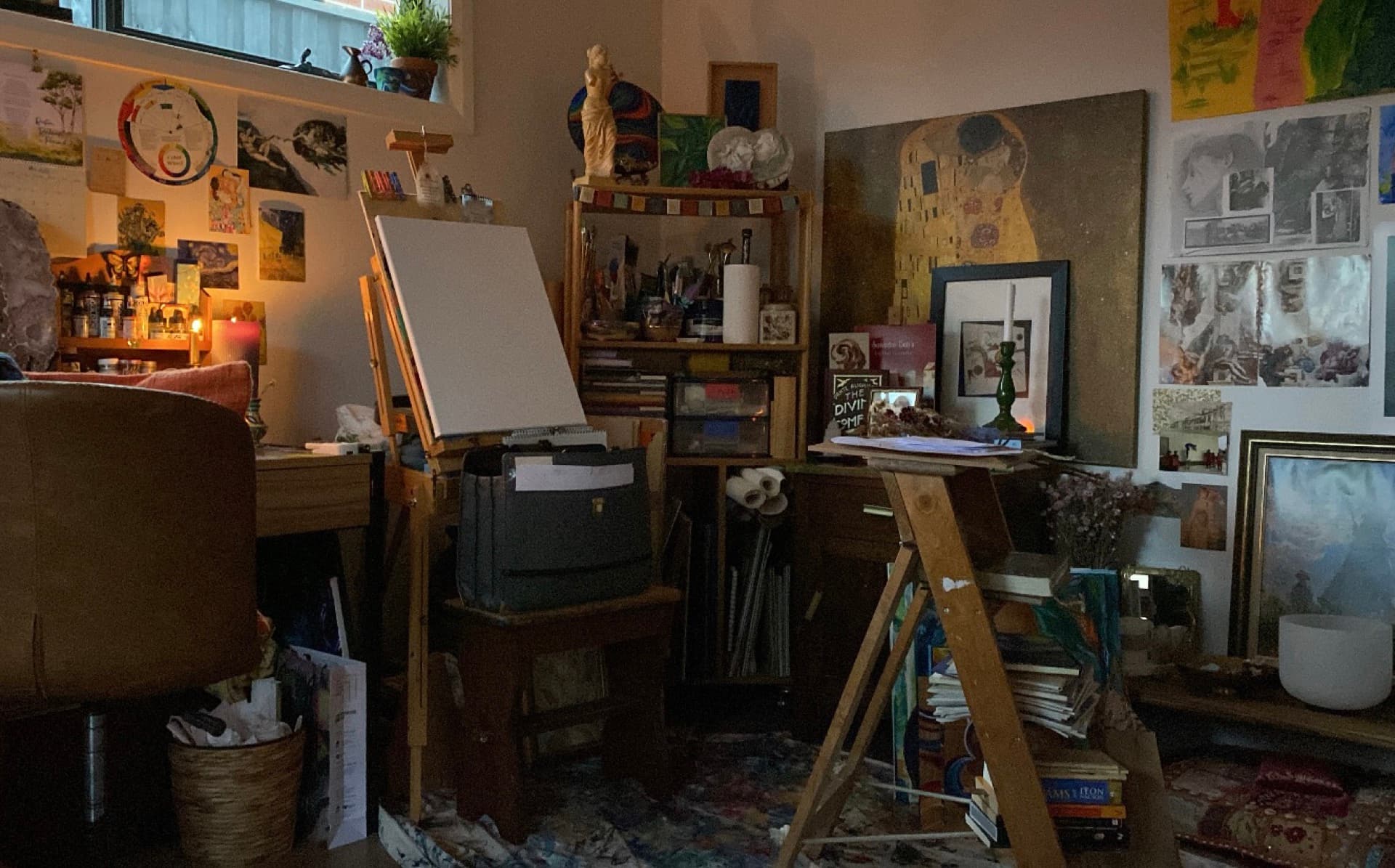 Artist studio with easel and paintings