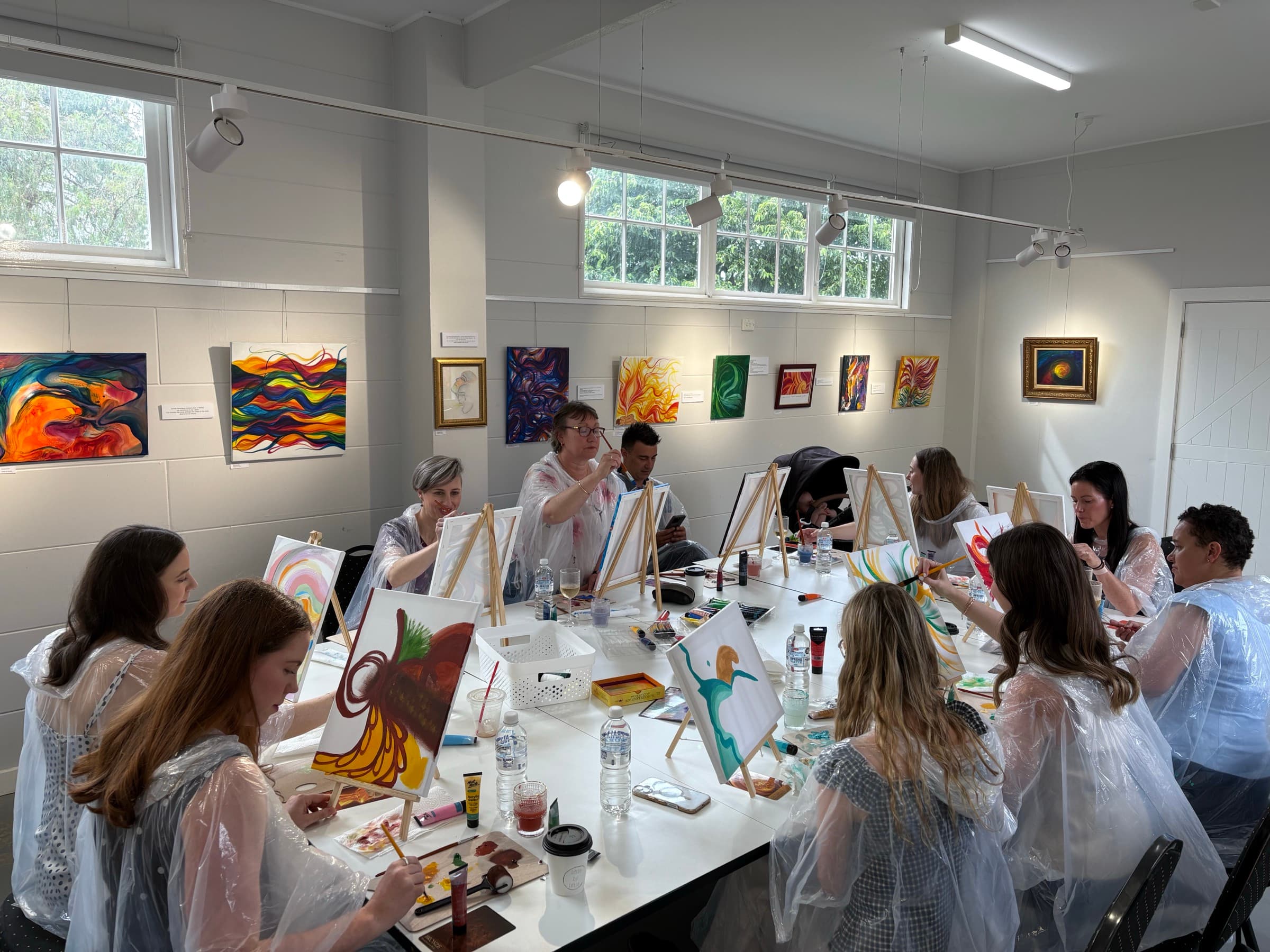 Vibrant paintings on easels